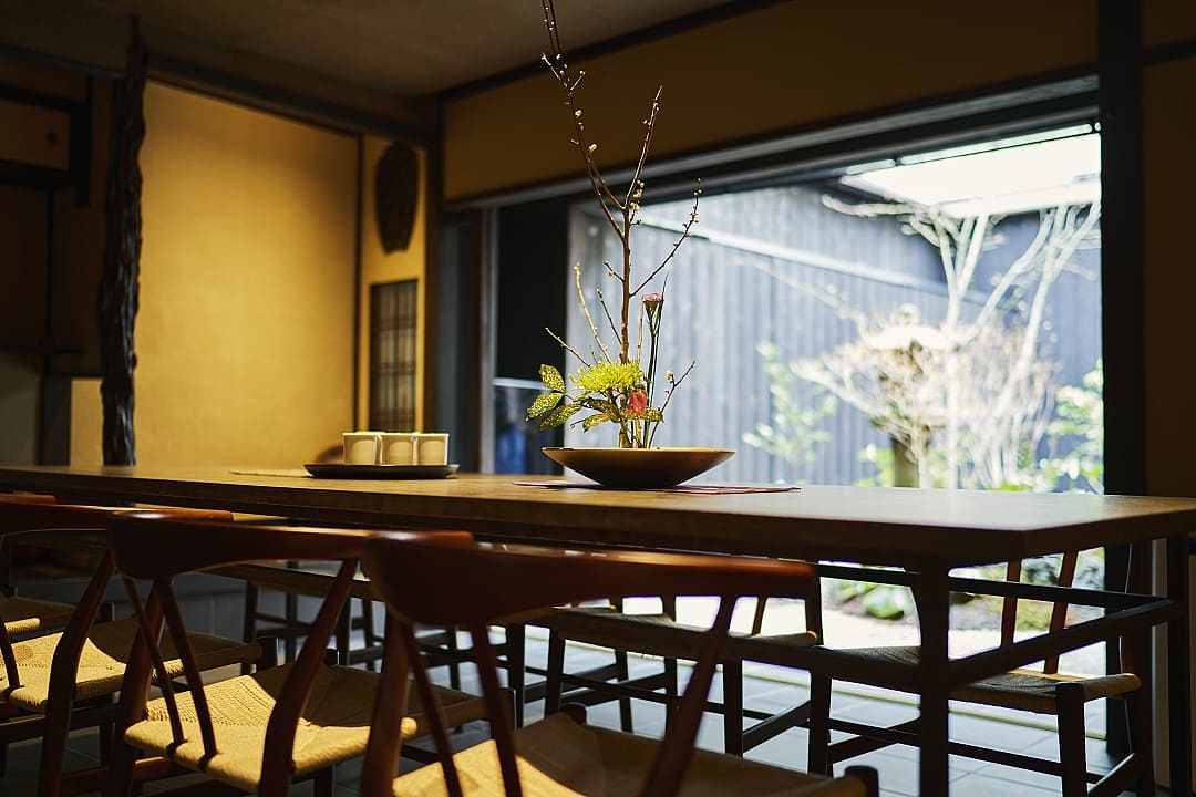 Family dining room in a traditional machiya townhouse in historic Kyoto.