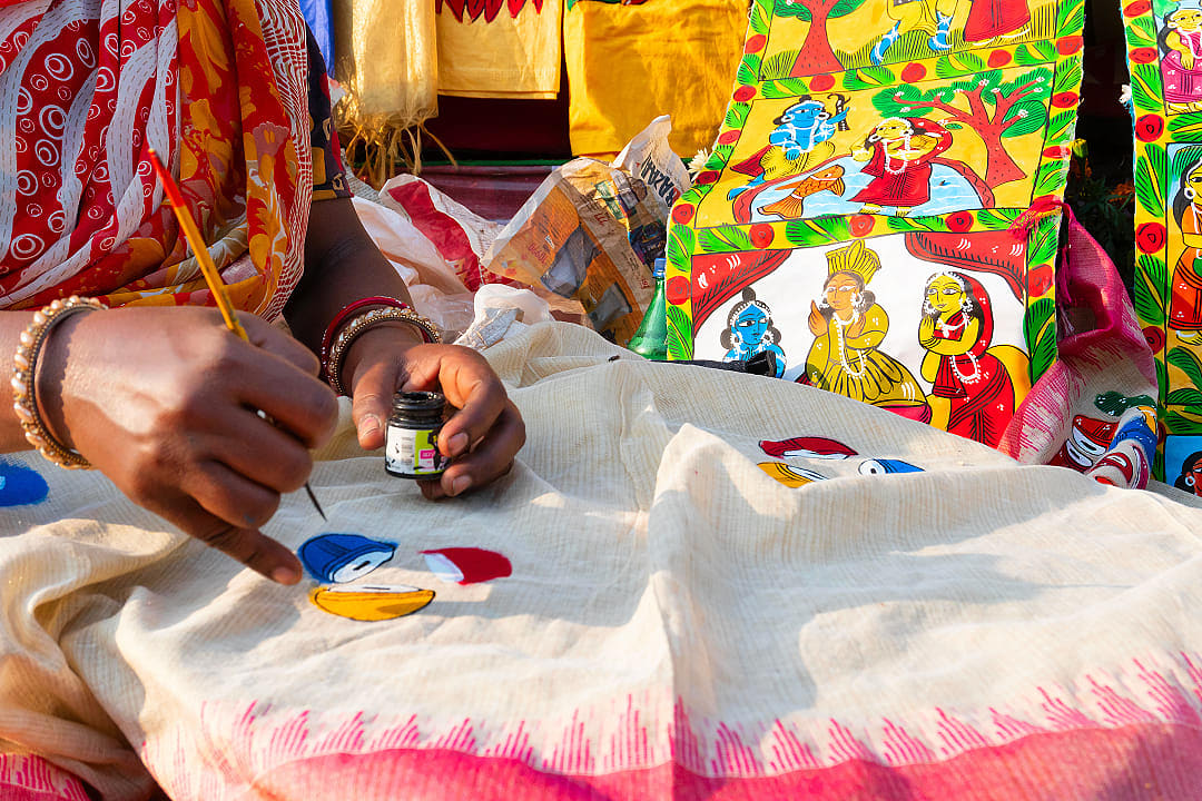 Young Bengali Artist at Work on a Pattachitra Painting.