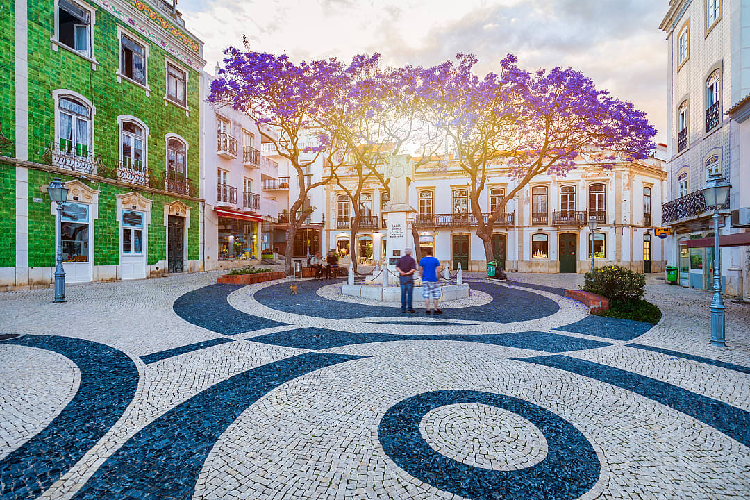 Cobblestoned neighborhood square in the old town center of Lagos, Portugal