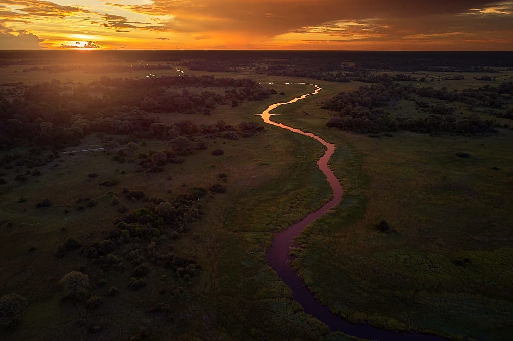 Sunset over Khwai River in Moremi Game Reserve, Botswana