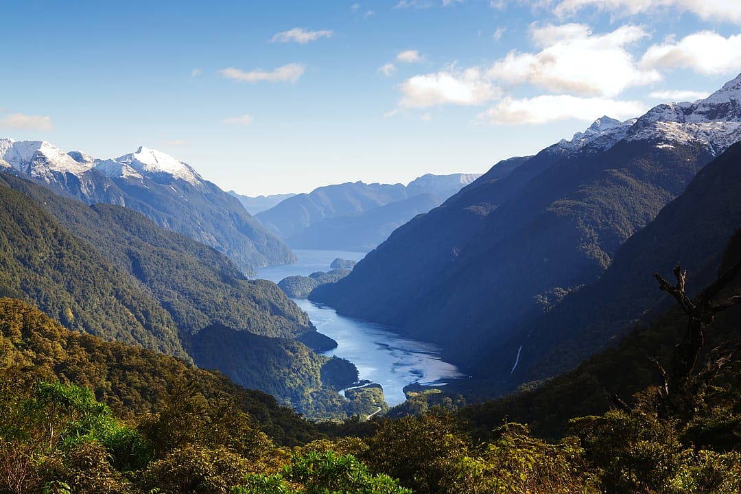Majestic Doubtful Sound winding through lush Fiordland mountains and valleys.