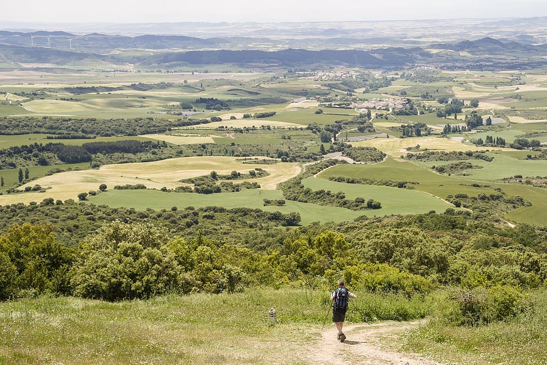 A hiker takes to the Camino de Santiago