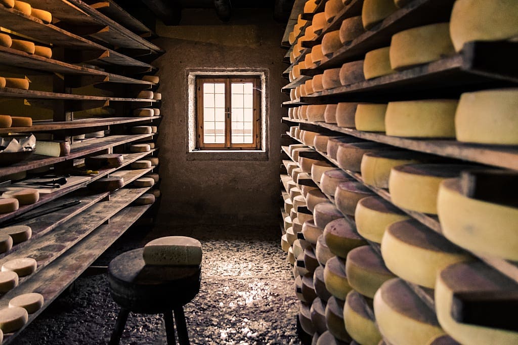 Cheese aging in small farm alpine hut in Val d'Aosta