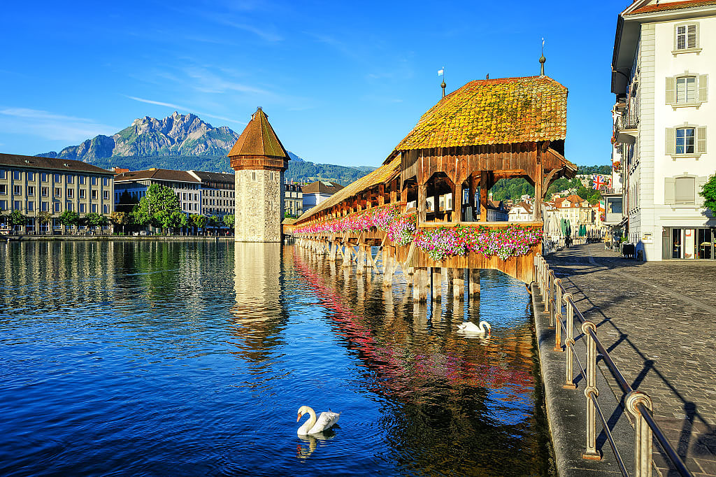 Deck covered in flowers on a lake in Lucerne, Switzerland.