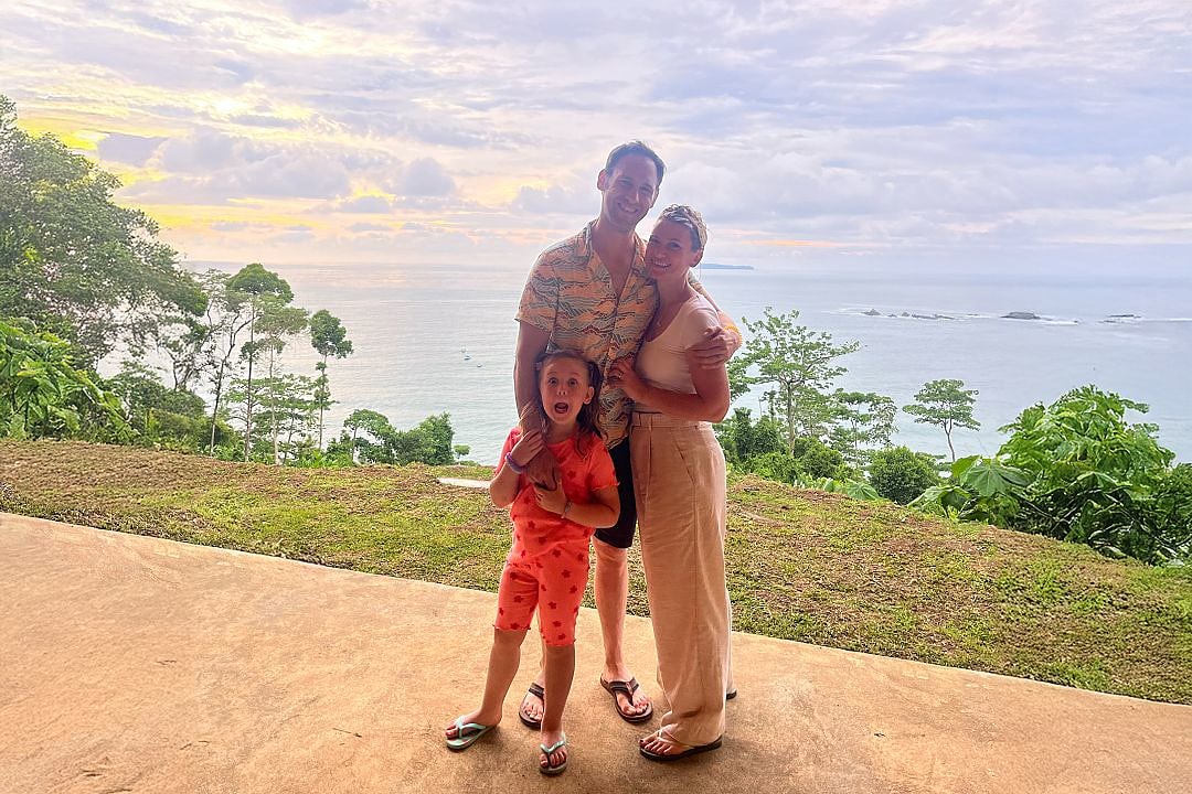 Family posing for photo in Costa Rica