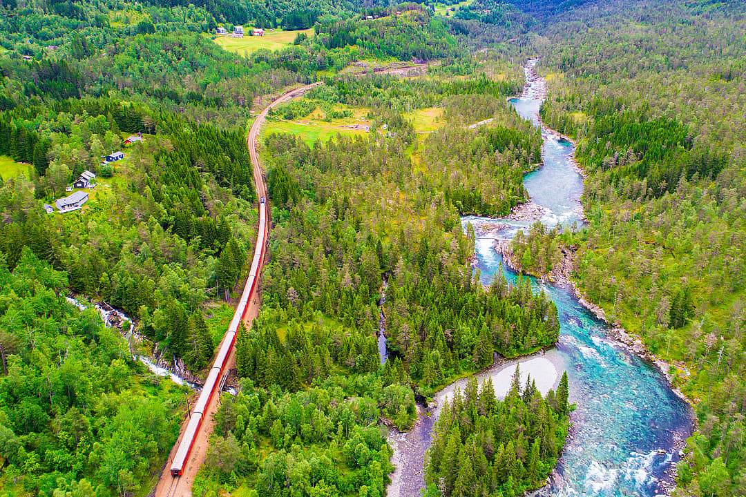 Train going throughout the Norwegian mountains