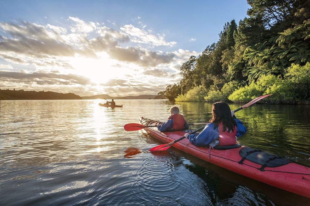 Family kayaking Lake Rotoita in Rotorua, New Zealand.  Photo courtesy Destination Rotorua