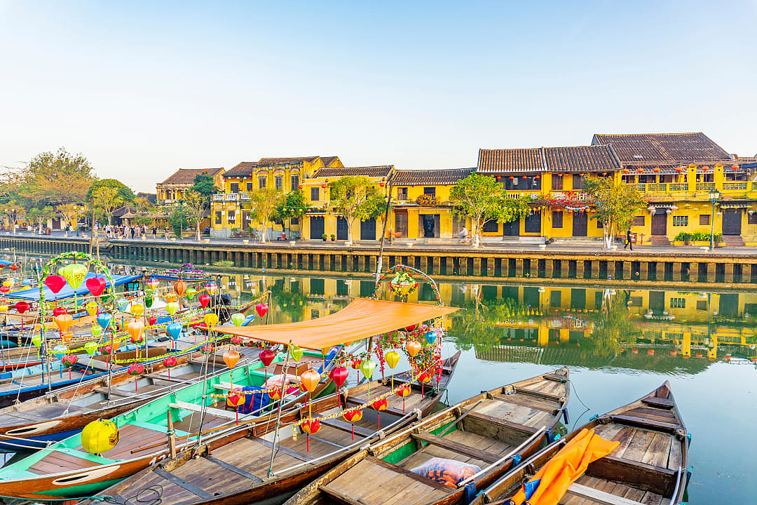 Boats moored along the river in Hoi An, Vietnam