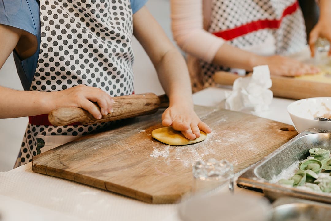 Kids making pasta