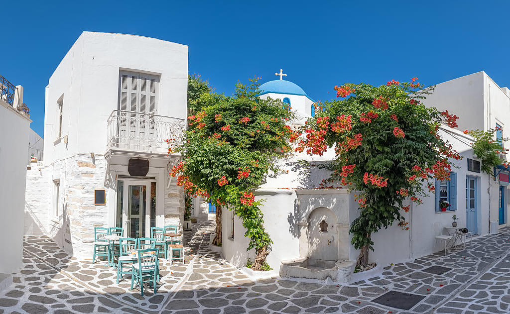 Cozy street with cafe in Parikia on Paros Island, Greece