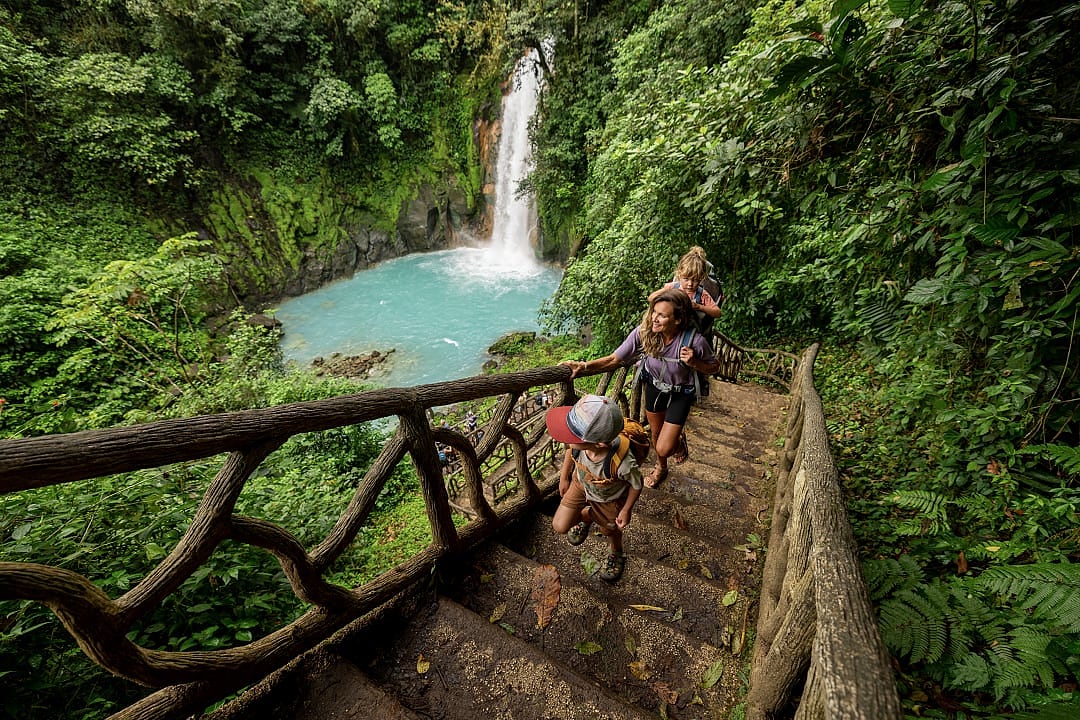 Family Hiking in Costa Rica Among Waterfalls