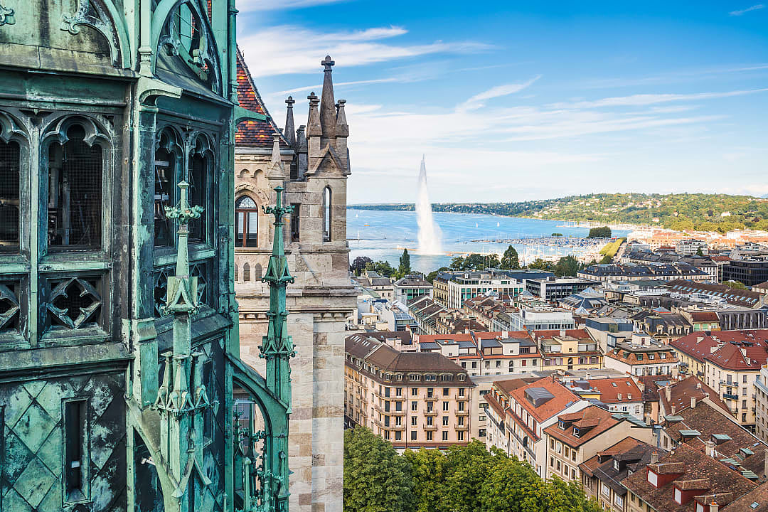 View of Geneva and jet d’eau fountain from height of the Cathedral of Saint Pierre