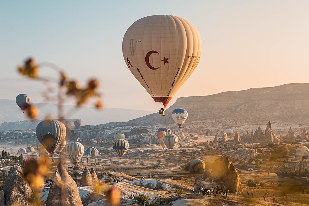 Hot air balloon flying over Cappadocia in Turkey