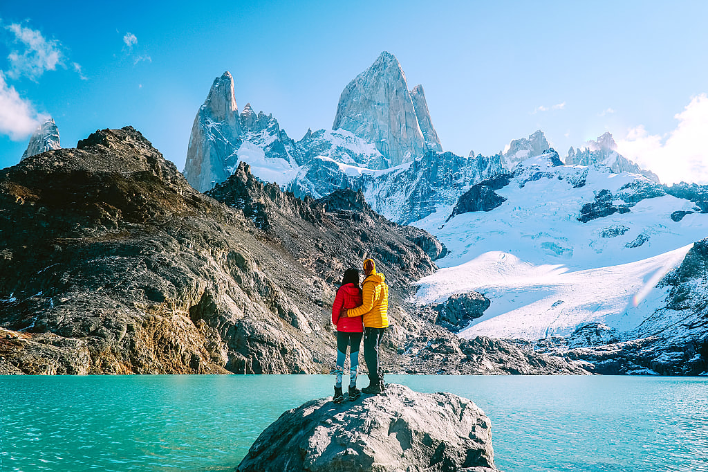 Couple enjoying the view at Mount Fitzroy in Patagonia