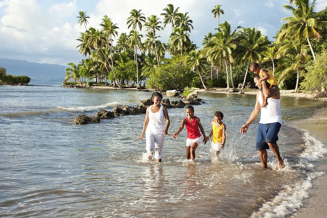 Family at the beach on Vanua Levu Island, Fiji