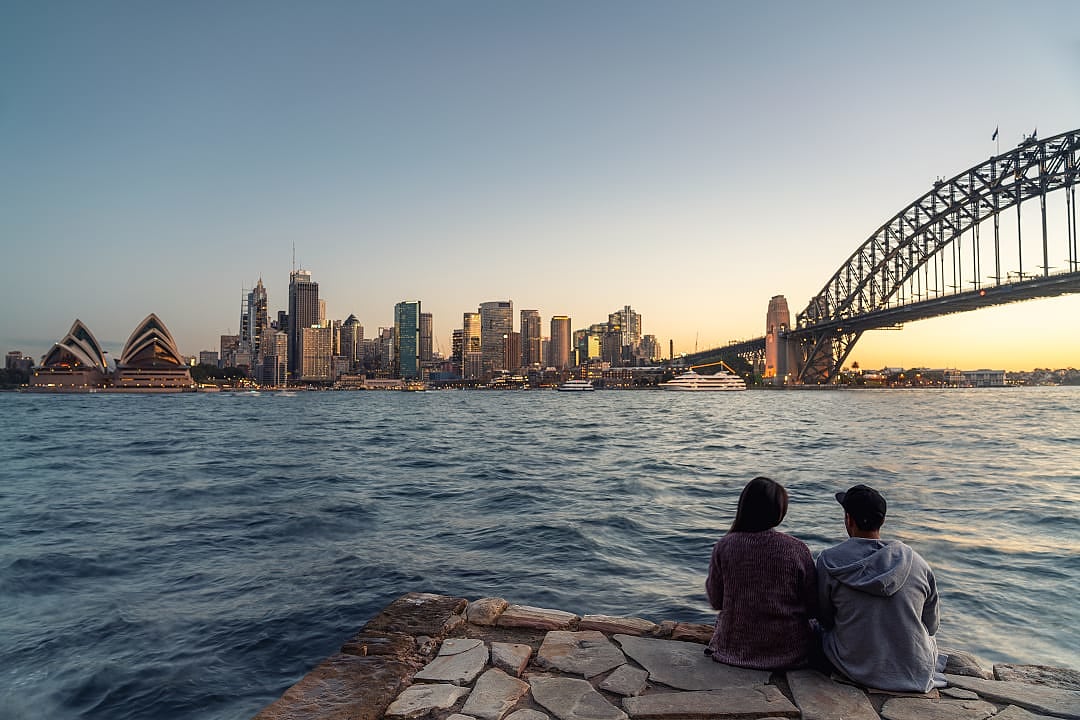 A couple explores Sydney, Australia.