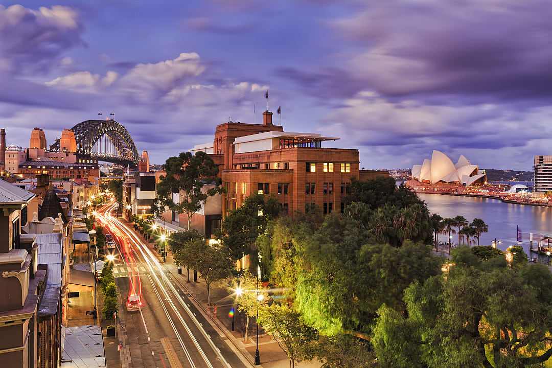 View of The Harbor Bridge at night.