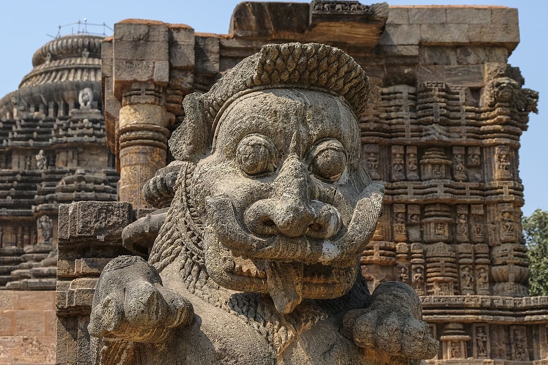 Carved stone lion sculpture at ancient sun temple entrance