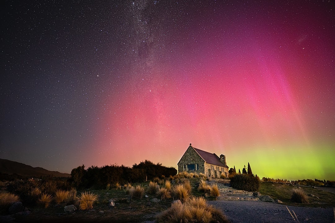 Aurora australis over a church in Lake Tekapo, New Zealand