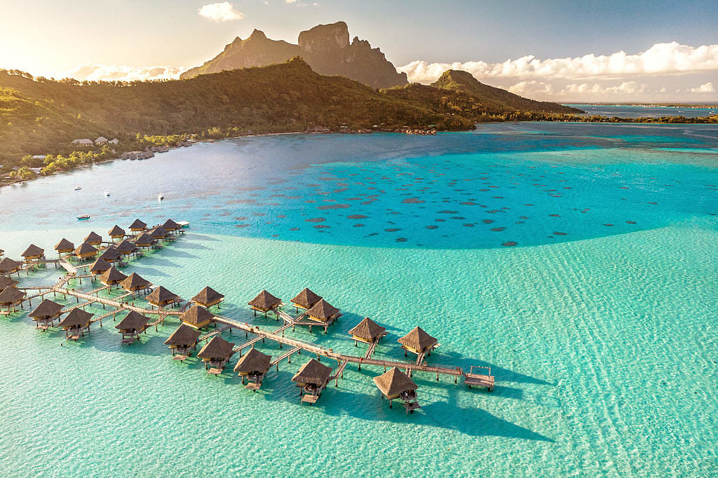 Overwater bungalows in Bora Bora. Photo by Stéphane Mailion, courtesy of Tahiti Tourisme