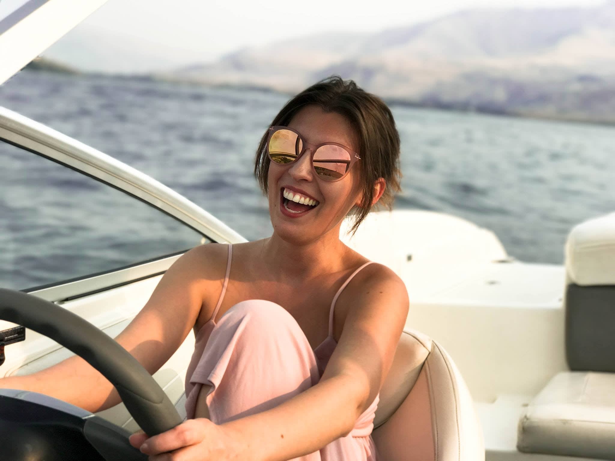 Sailing the high seas: the best yacht charter experience girl on boat