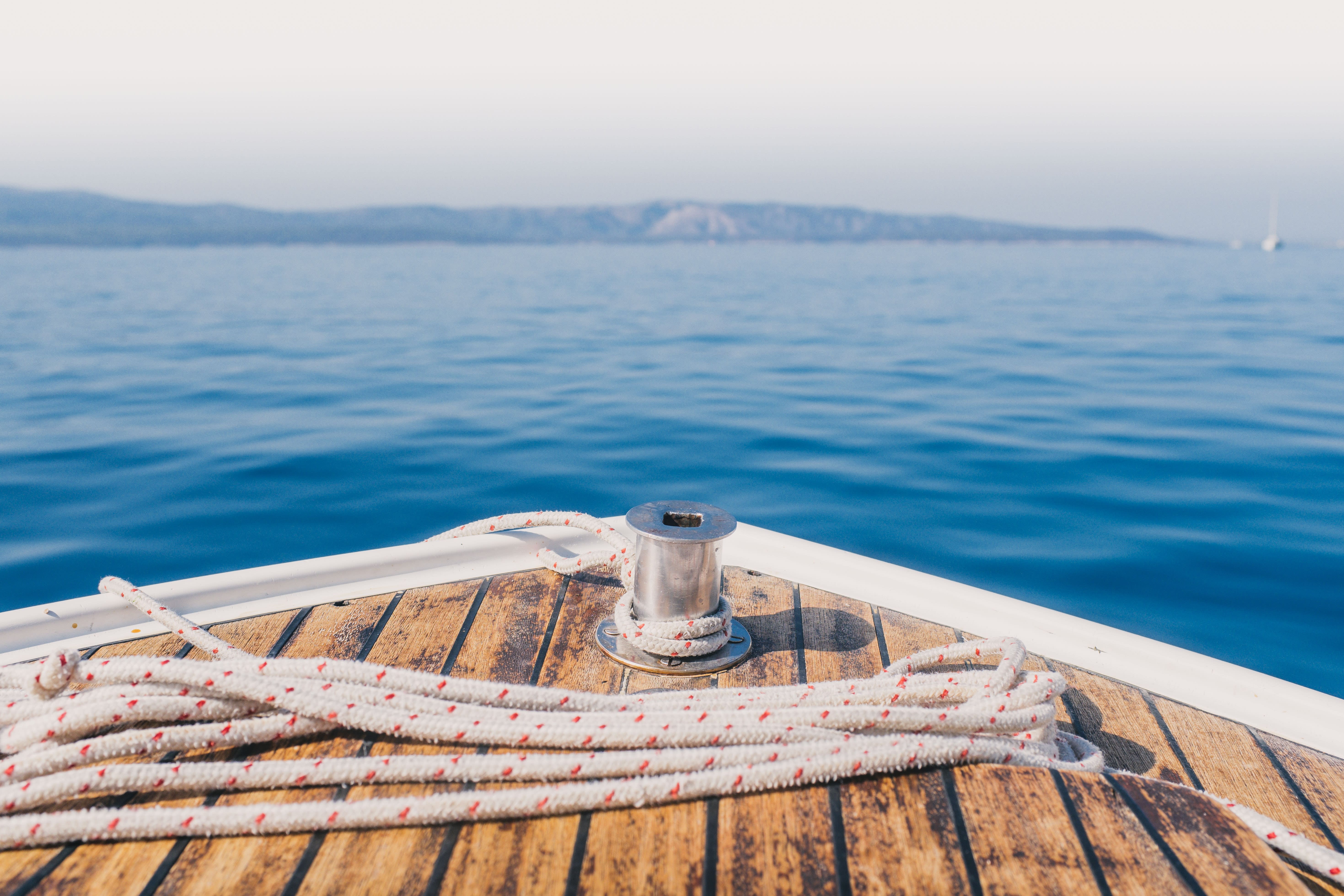 Sailing the high seas: learning basic nautical terms boat with rope on water
