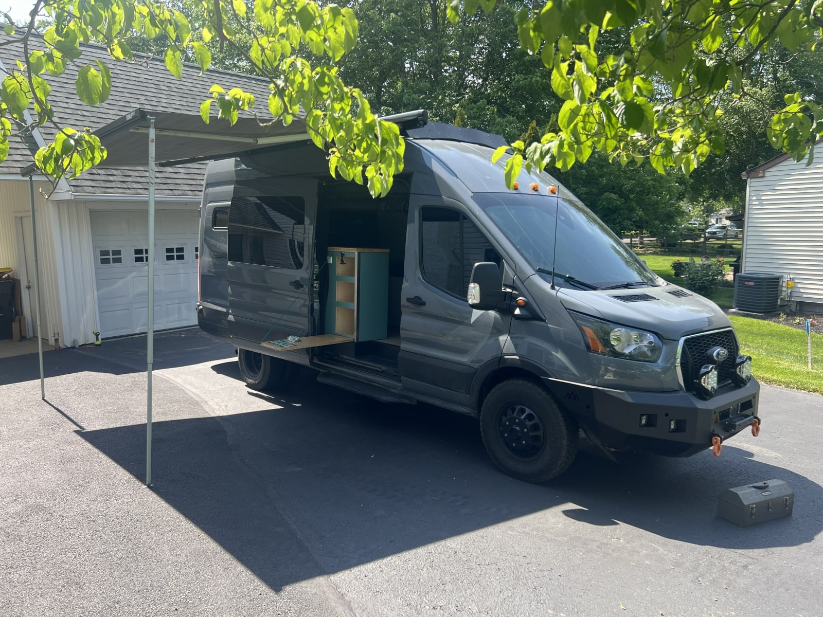 The van's awning extended