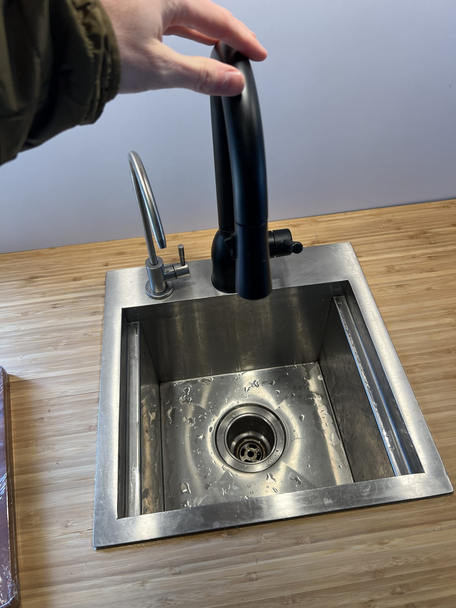 A tiny sink inside the van