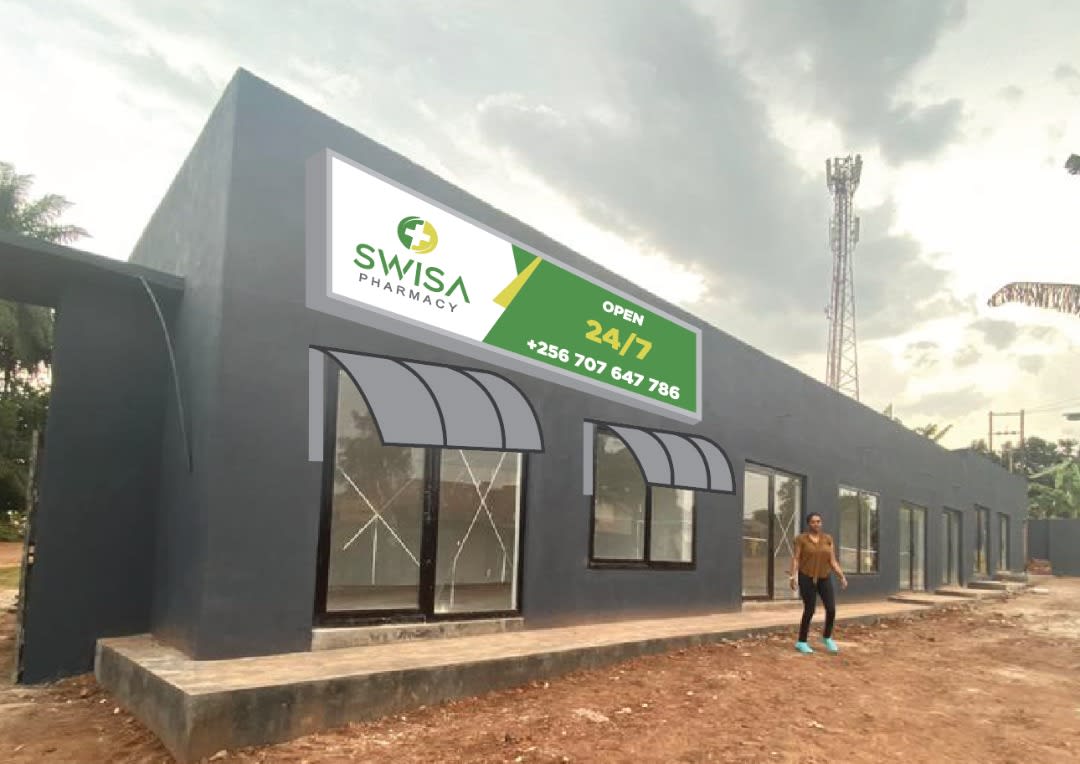 Shopfront with an example green and white pharmacy sign concept