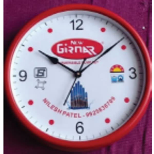 red-rimmed wall clock