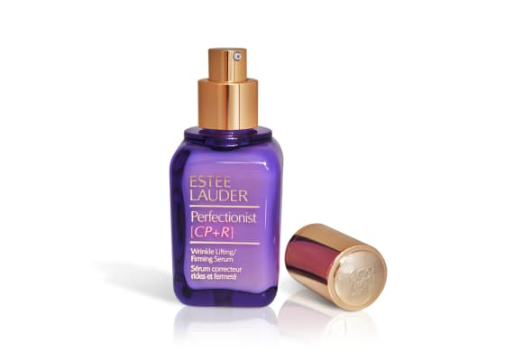 Estée Lauder Perfectionist serum bottle with a decorative aluminum collar and cap