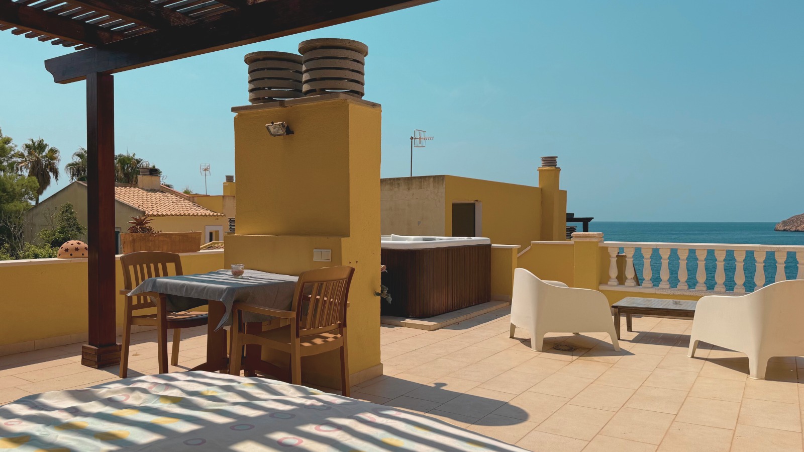 Penthouse rooftop terrace with private jacuzzi and sea view