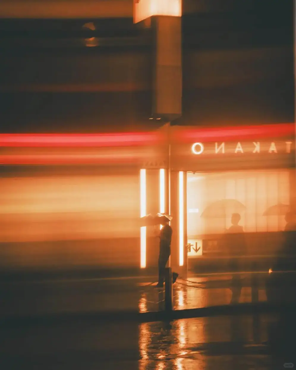 Warm orange light on a rainy night