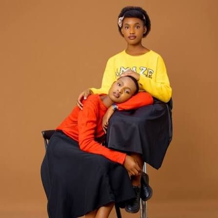Germaine wo mu itsinda rya Alicia and Germaine yishimiye intsinzi mu bizamini by photo