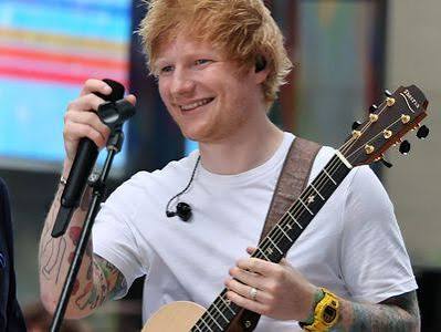 Abaguze amatike yo kujya mu bitaramo bya Ed Sheeran byahagaritswe n'imvura, bagi photo 1